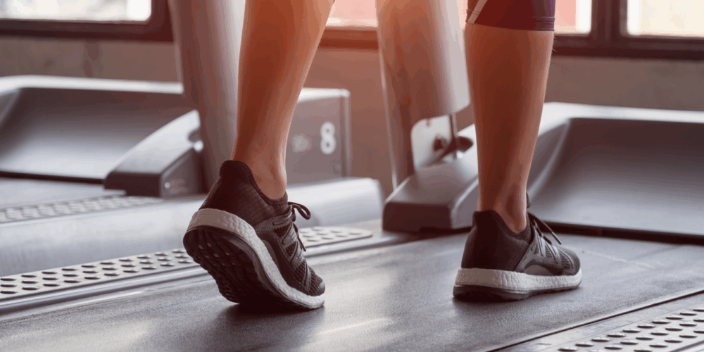 Woman walking on treadmill
