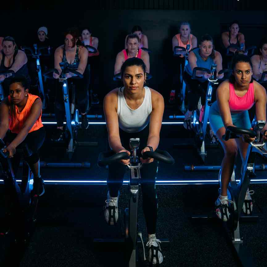 Women exercising on bikes